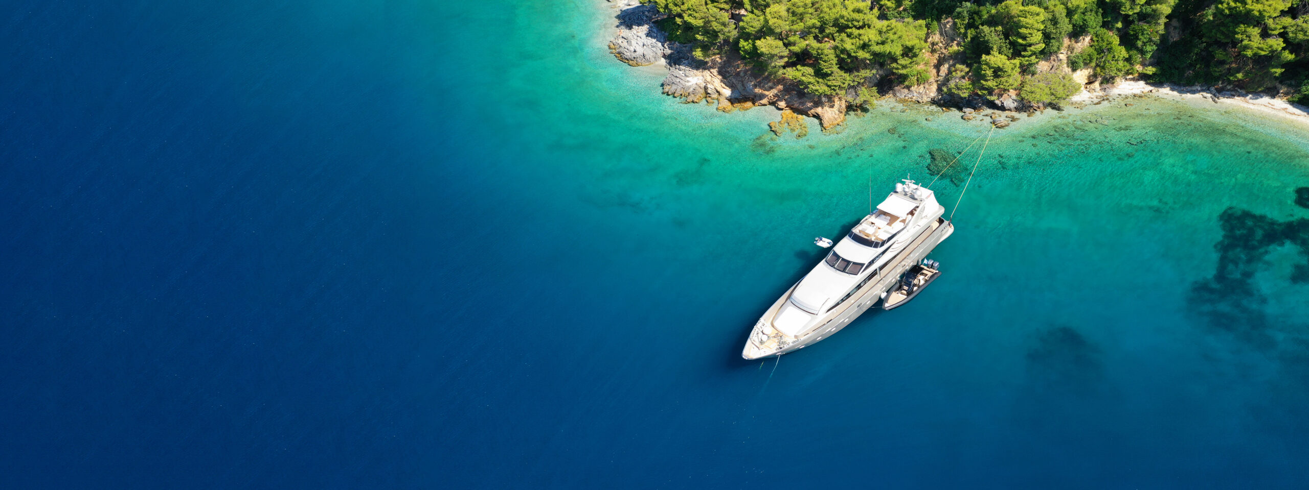 Aerial,Drone,Ultra,Wide,Photo,Of,Yacht,Anchored,In,Famous