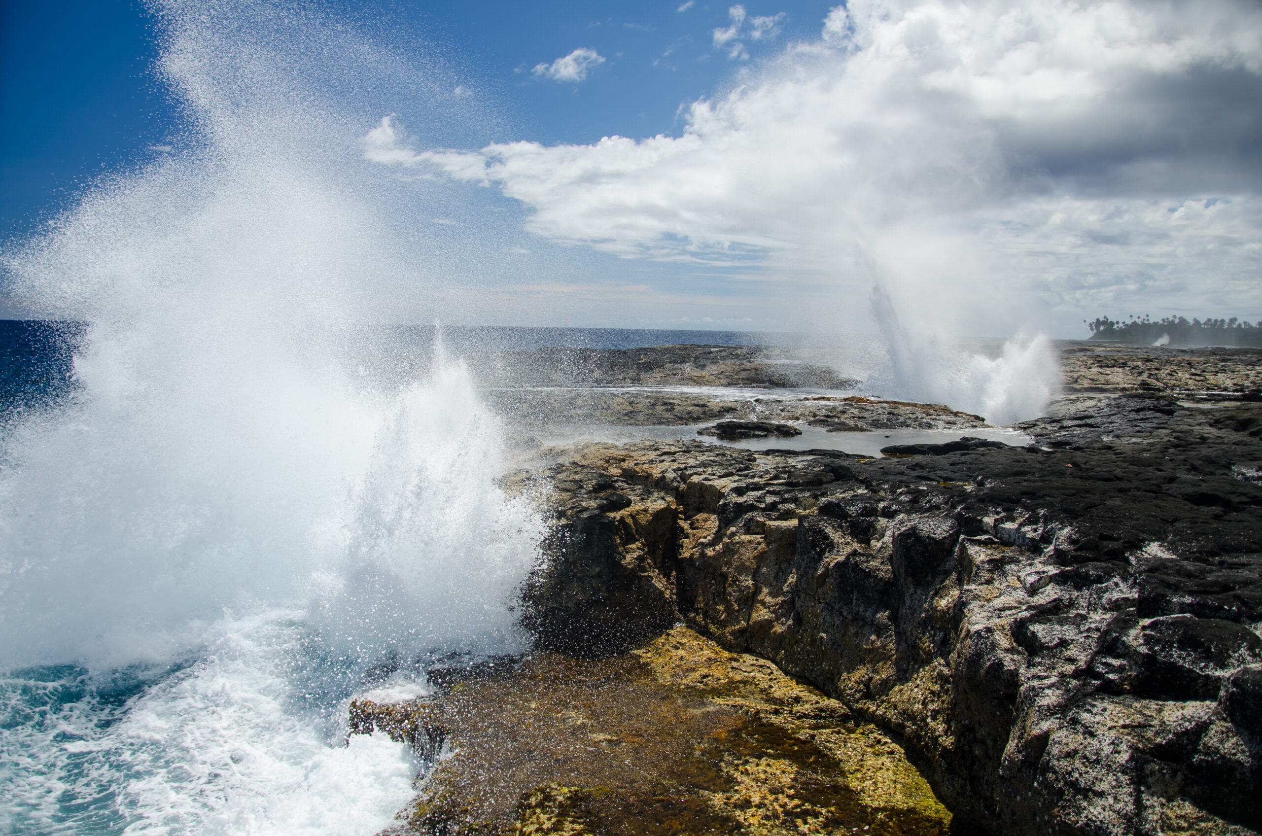 The,Alofaaga,Blowholes,Under,The,Sunlight,And,A,Blue,Cloudy