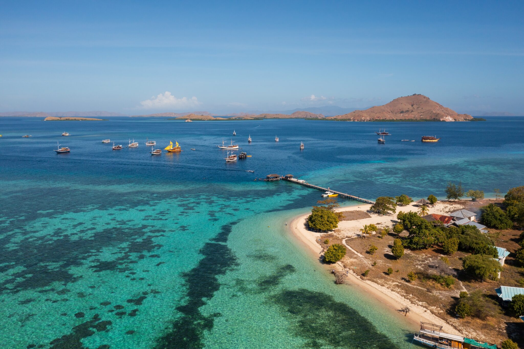 Komodo,,Indonesia:,Aerial,Of,Phinisi,Boat,Anchored,By,The,Kanawa