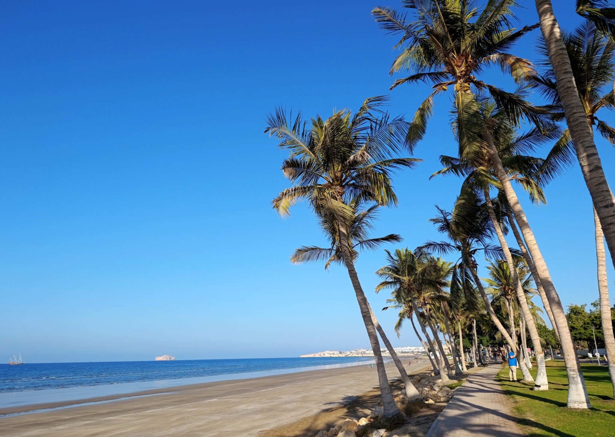 Al,Qurum,Beach,And,Waterfront,Walking,Area,Among,The,Palm