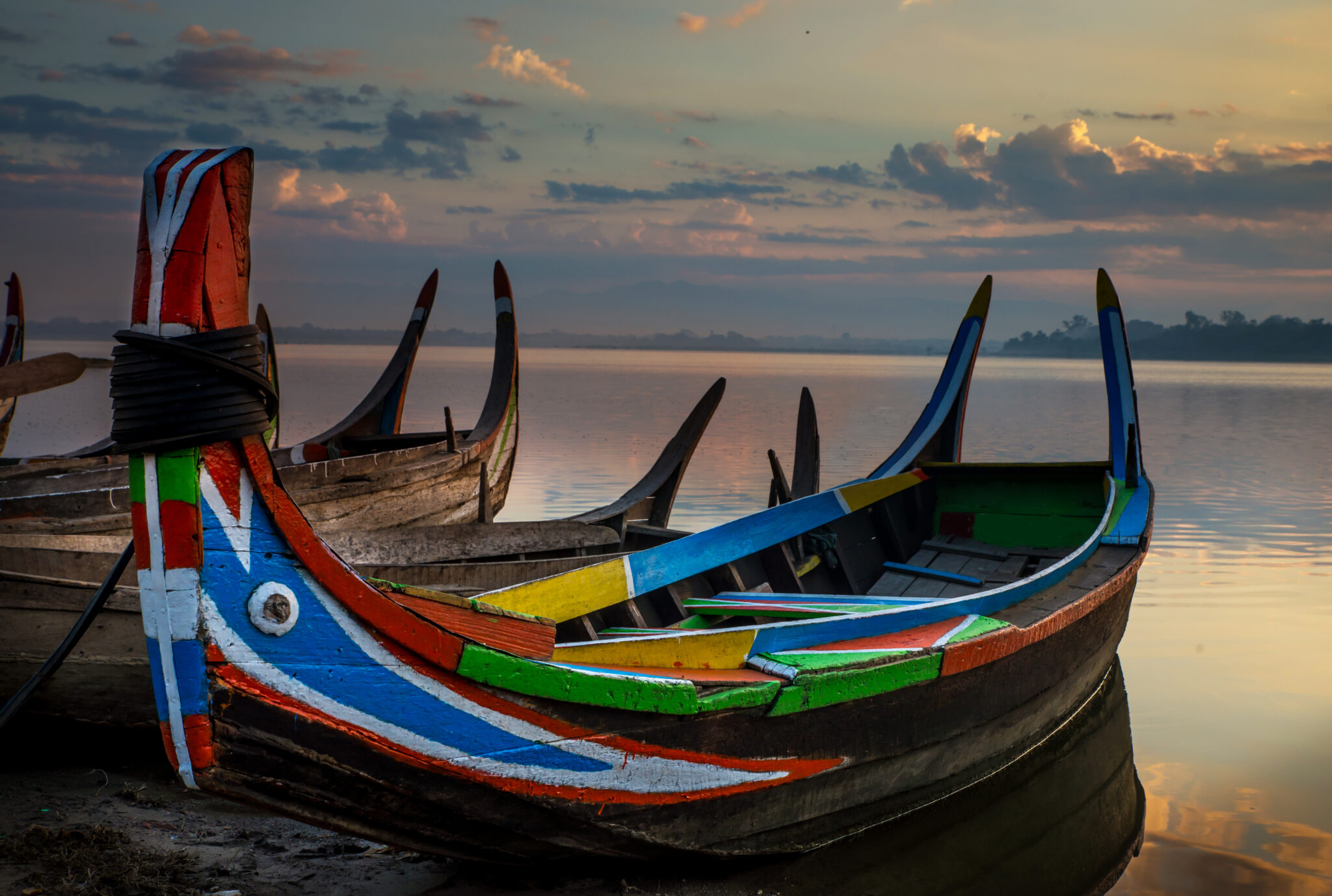 Colorful,Old,Boats,On,A,Lake,In,Myanmar