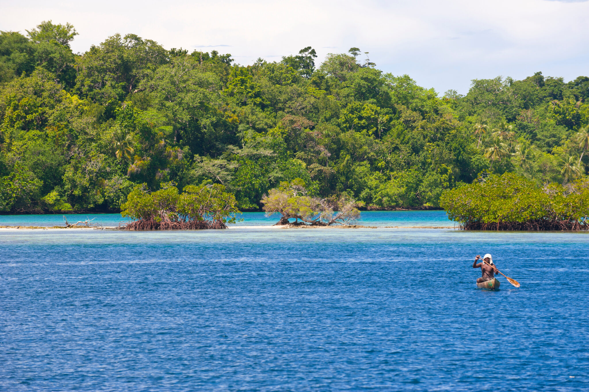 Man,Sitting,In,His,Canoe,,Marovo,Lagoon,,Solomon,Islands,,Pacific