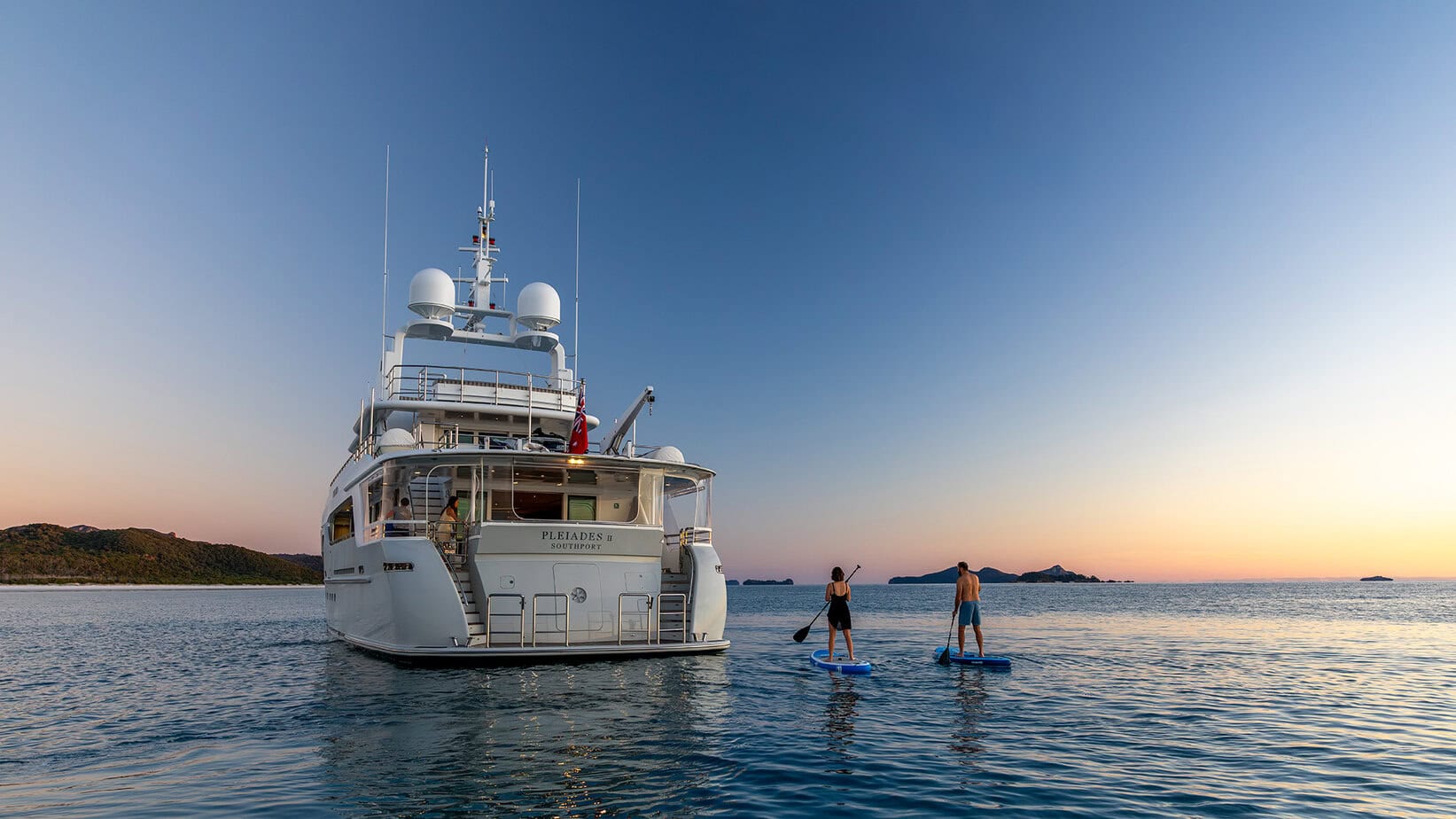 Paddleboarding on Whitsundays Charter Yacht Pleiades II Great Barrier Reef