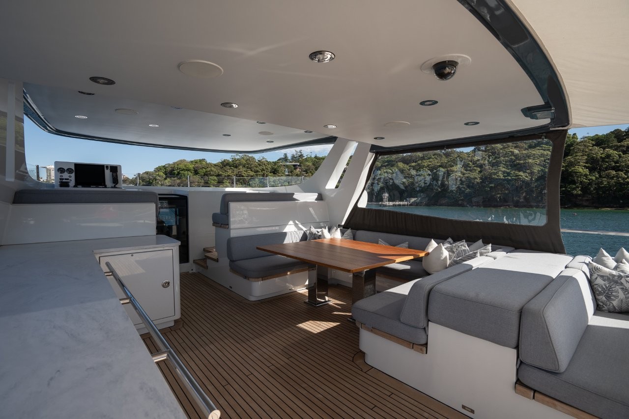 Flybridge Dinning - Luxury Charter Yacht