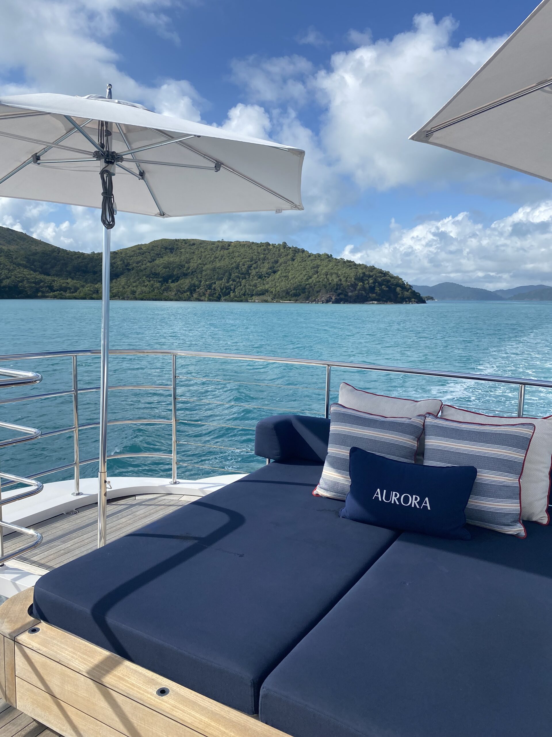 Relax on a sunbed on Luxury Yacht Charter Aurora 