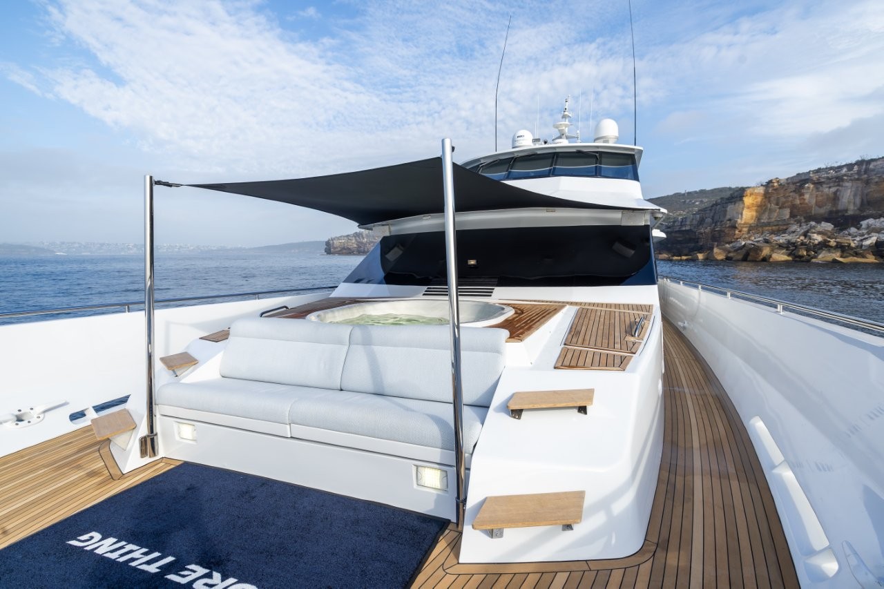 Relax in the onboard Jacuzzi on the bow of the luxury charter yacht Shore Thing
