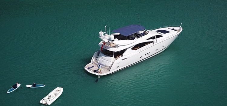 What is included in a superyacht charter fee in the Whitsundays?